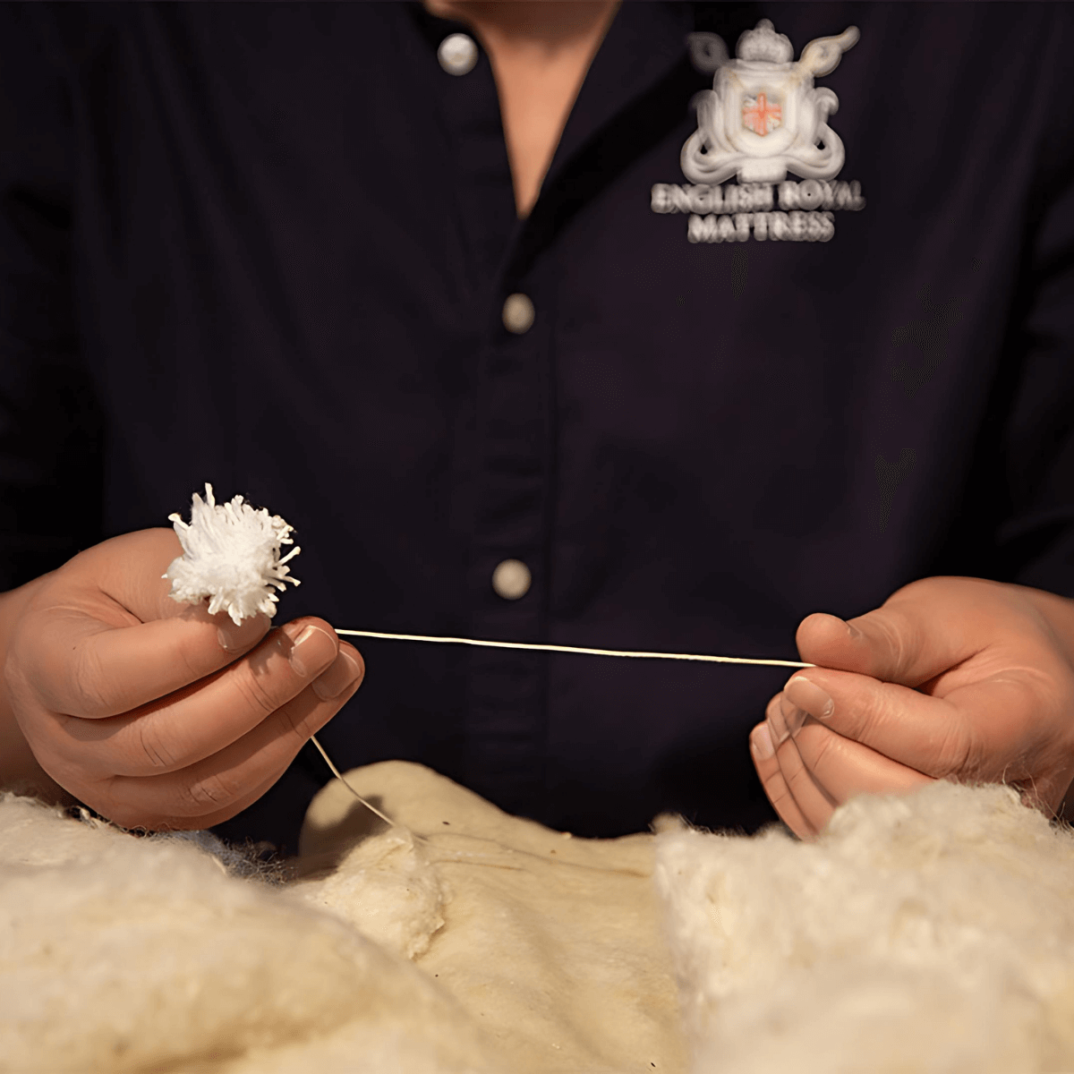Handcrafting English Royal Mattress with natural, organic materials by a traditional artisan.