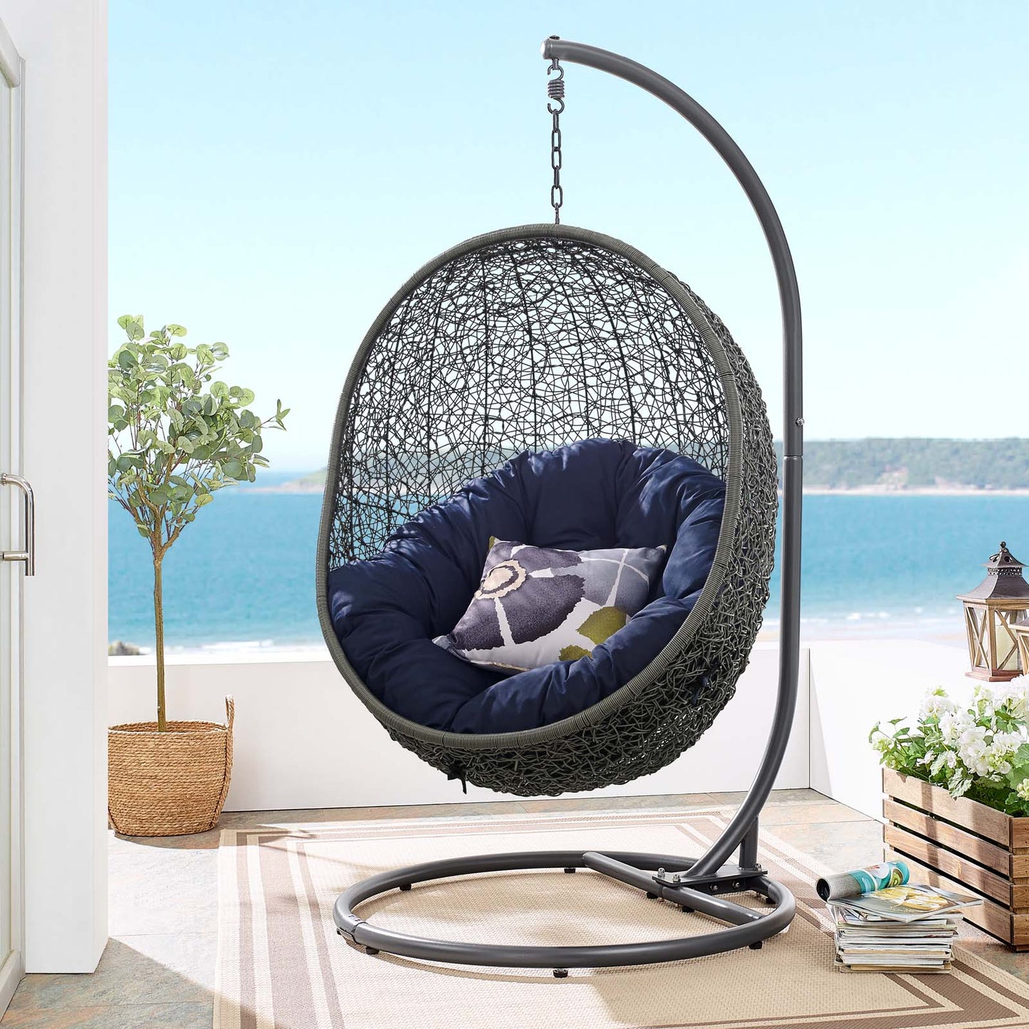 Silla mecedora para patio exterior Hide con soporte de Modway